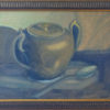 Antique pewter sugar bowl and teaspoon, painted in blues and gold tones, in a patterned frame